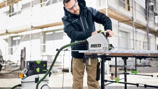 man works outside with Festool TS 60