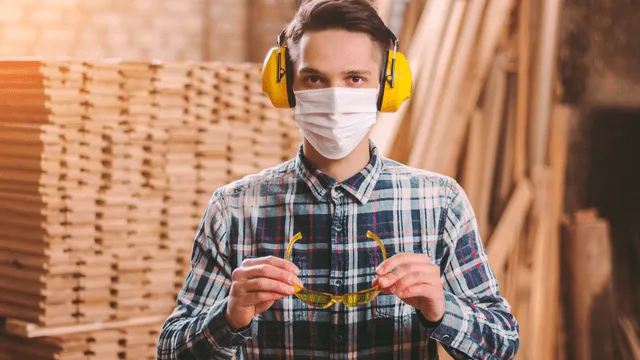 man wears face protection